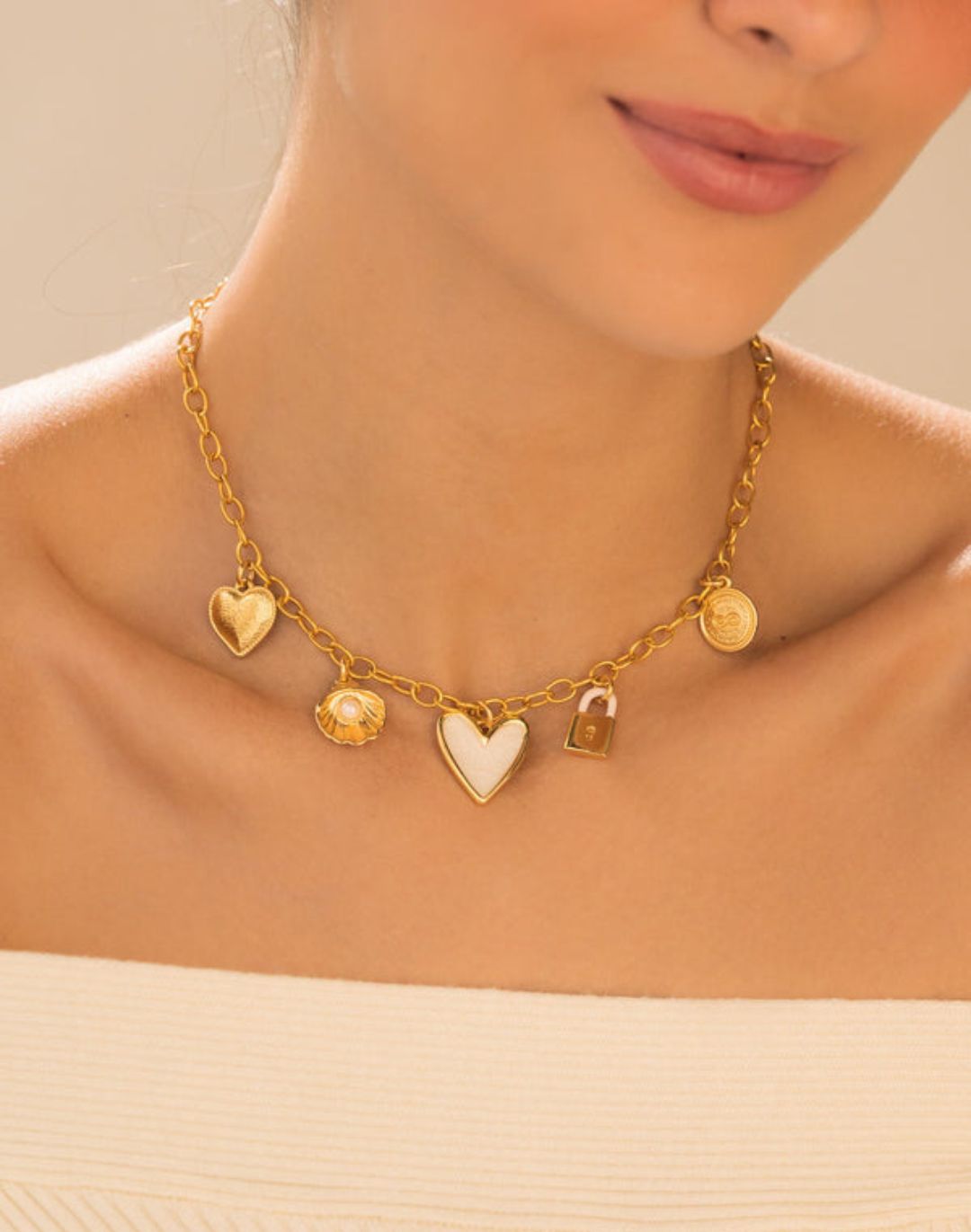 COLLAR MULTICHARMS CORAZÓN CONCHA DE MAR