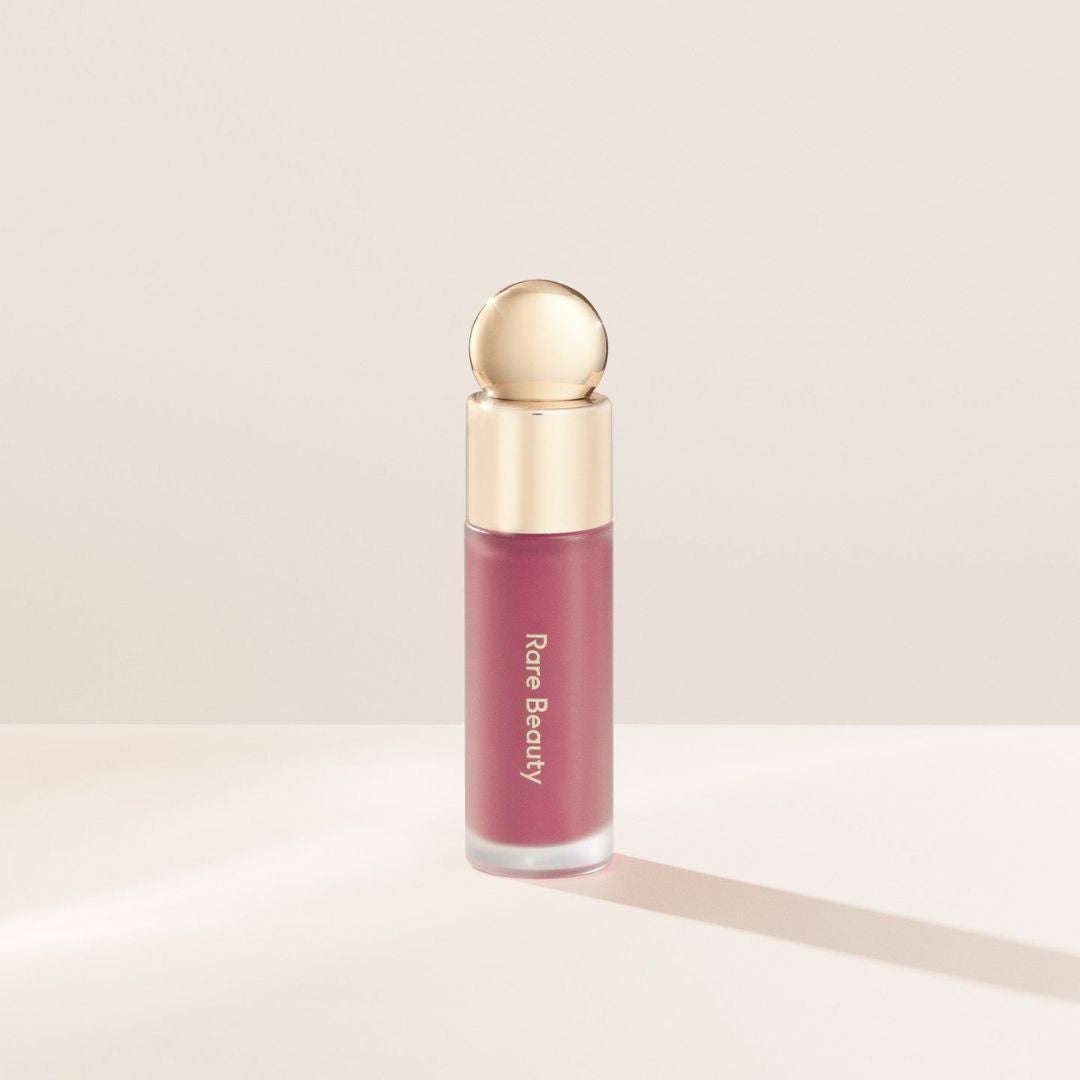 RUBOR LIQUIDO DE BROCHA SUAVE, STAY VULNERABLE CASI ROSA DE SELENA GOMEZ