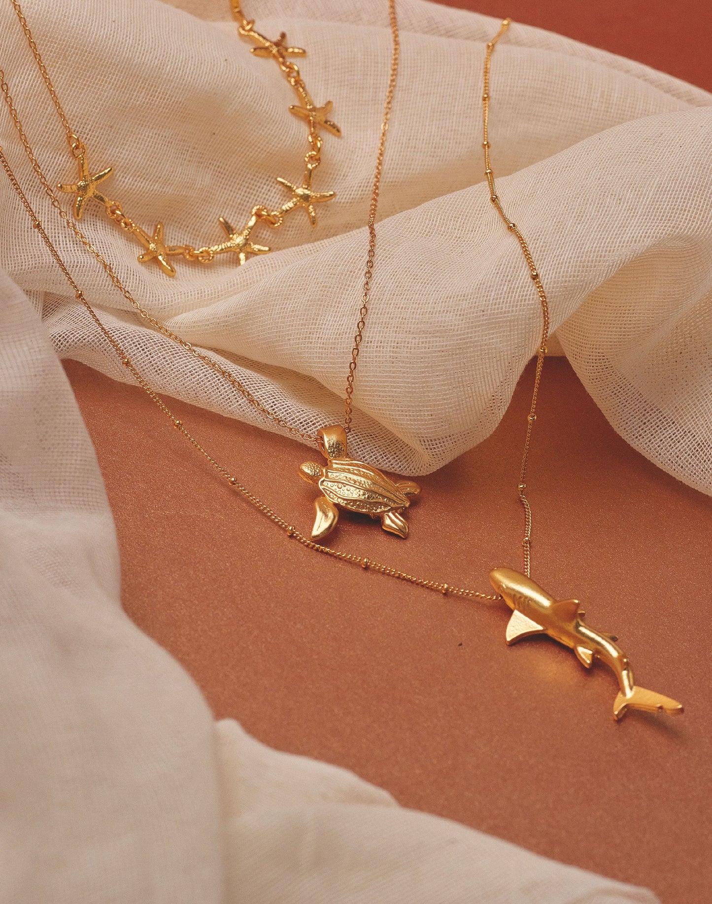 SET DE 3 COLLARES BAJO EL AGUA